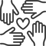 four hands surround a heart