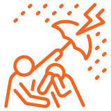 one person uses an umbrella to shield another person from a thunderstorm