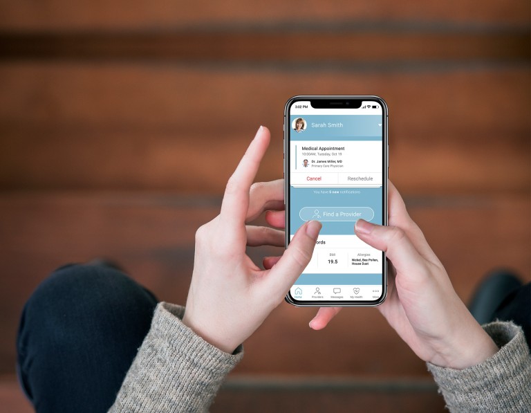 A person manages a virtual health appointment using the MDLIVE mobile app on their smartphone